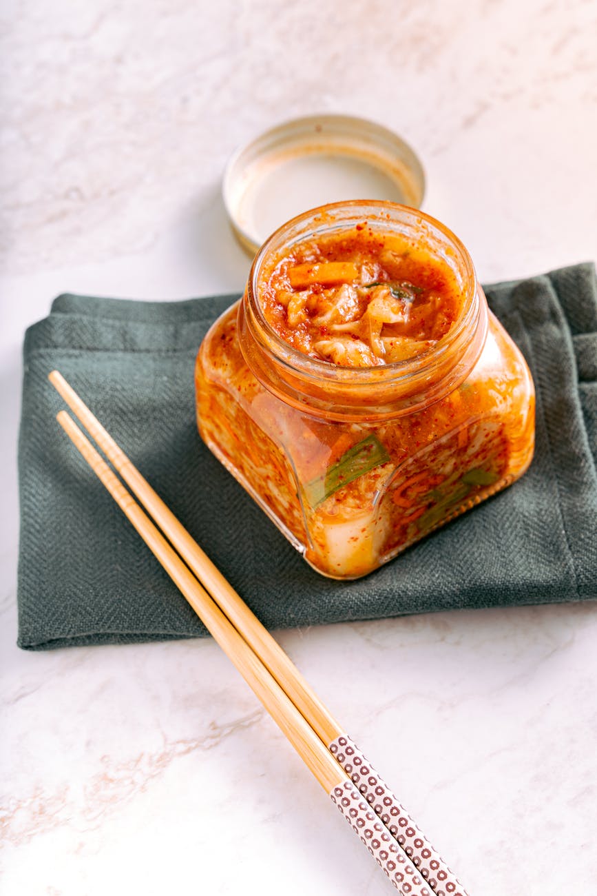 kimchi on clear glass jar